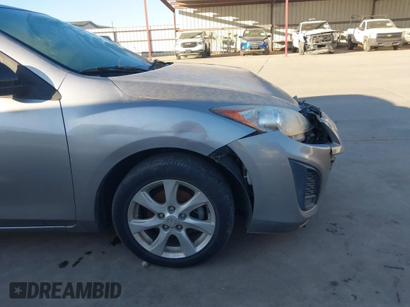 2011 Mazda 3 i Touring z VIN JM1BL1VG6B1435453, wystawiony jako IAAI lot #41740142 z przebiegiem 162 188 mil mil oraz . Historia ofert i sprzedaży dostępna na DreamBid. Obrazek 14.