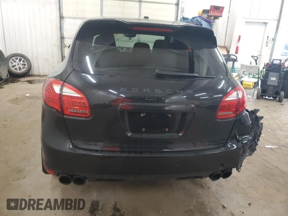2014 Porsche Cayenne z VIN WP1AA2A25ELA91302, wystawiony jako Copart lot #59386795 z przebiegiem 161 865 mil mil oraz Szkoda całkowita • Salvage title. Historia ofert i sprzedaży dostępna na DreamBid. Obrazek 6.