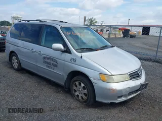 2003 Honda Odyssey EX-L with VIN 5FNRL18033B015297, listed as a IAAI auction lot 42766570 with 156,035 mi miles and . Bid and sale history available at DreamBid. Image 1.