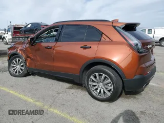 2020 Cadillac XT4 FWD Sport с VIN 1GYFZER45LF016273, выставлен на аукционе Copart как лот 53550685 с пробегом 66 037 миль миль и Списание • Salvage title. История ставок и продаж доступна на DreamBid. Изображение 2.