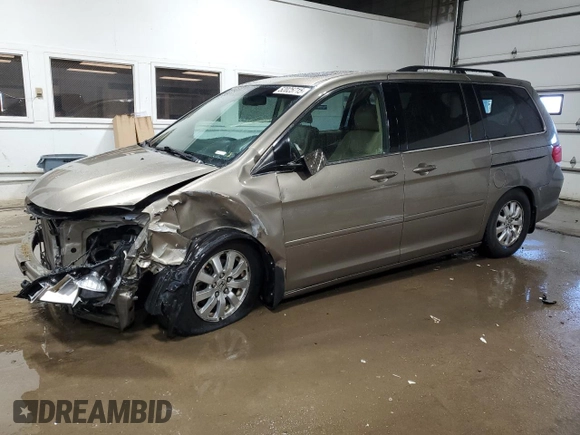 2009 Honda Odyssey EX-L with VIN 5FNRL38759B402158, listed as a Copart auction lot 52025715 with 239,340 mi miles and Salvage Title. Bid and sale history available at carsss.com. Image 1.