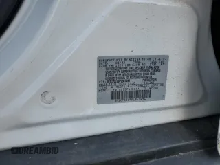 2023 Nissan Kicks SV with VIN 3N1CP5CV9PL567496, listed as a Copart auction lot 60511995 with 27,514 mi miles and Salvage title. Bid and sale history available at DreamBid. Image 13.