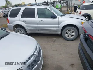 2005 Ford Escape Hybrid with VIN 1FMCU95H05KC95225, listed as a IAAI auction lot 41798610 with 216,659 mi miles and . Bid and sale history available at DreamBid. Image 13.