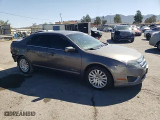 2011 Ford Fusion Hybrid with VIN 3FADP0L39BR329534, listed as a Copart auction lot 69272883 with 191,524 mi miles and Salvage Title. Bid and sale history available at carsss.com. Image 4.