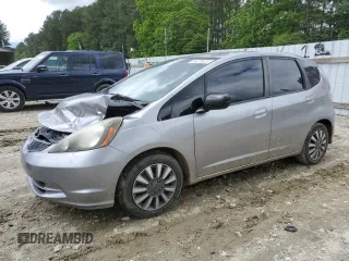 2009 Honda Fit with VIN JHMGE88299S003063, listed as a Copart auction lot 58370825 with 122,560 mi miles and Salvage title. Bid and sale history available at DreamBid. Image 1.