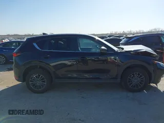 2020 Mazda CX-5 Touring with VIN JM3KFACM0L0780265, listed as a IAAI auction lot 41825873 with 151,888 mi miles. Bid and sale history available at carsss.com. Image 13.