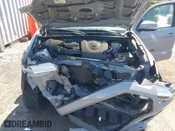 2020 Toyota Tacoma SR5 z VIN 3TMCZ5AN6LM330074, wystawiony jako IAAI lot #41982461 z przebiegiem 43 756 mil mil oraz . Historia ofert i sprzedaży dostępna na DreamBid. Obrazek 10.