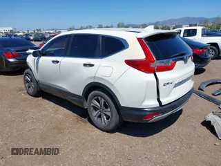 2017 Honda CR-V LX with VIN 2HKRW6H34HH219033, listed as a IAAI auction lot 41948876 with 105,813 mi miles. Bid and sale history available at carsss.com. Image 3.