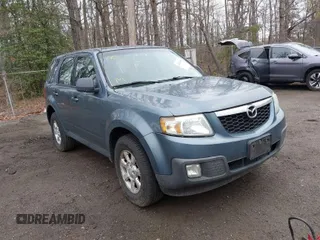 2010 Mazda Tribute Sport with VIN 4F2CY9C79AKM01295, listed as a IAAI auction lot 41962901 with 183,002 mi miles and . Bid and sale history available at DreamBid. Image 1.