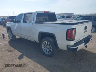 2017 GMC Sierra 1500 Denali z VIN 3GTU2PEC8HG502379, wystawiony jako IAAI lot #42040538 z przebiegiem 108 960 mil mil oraz . Historia ofert i sprzedaży dostępna na DreamBid. Obrazek 3.