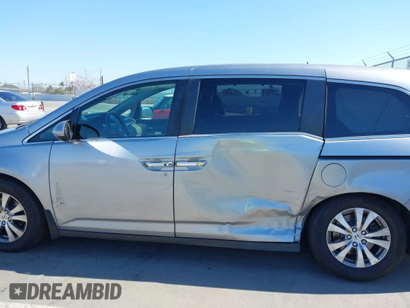 2016 Honda Odyssey SE with VIN 5FNRL5H32GB153002, listed as a IAAI auction lot 42084022 with 63,764 mi miles and . Bid and sale history available at DreamBid. Image 14.