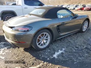 2022 Porsche Boxster z VIN WP0CA2A85NS205240, wystawiony jako Copart lot #51125615 z przebiegiem Nie podano mil oraz Nie do naprawy. Historia ofert i sprzedaży dostępna na DreamBid. Obrazek 3.