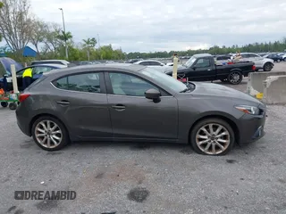2015 Mazda 3 S Grand Touring with VIN JM1BM1M35F1264244, listed as a IAAI auction lot 41674683 with 119,684 mi miles and . Bid and sale history available at DreamBid. Image 13.