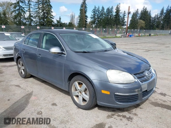 2009 Volkswagen Jetta Sedan SE with VIN 3VWRM71K59M069259, listed as a IAAI auction lot 41818850 with 164,157 mi miles. Bid and sale history available at carsss.com. Image 1.