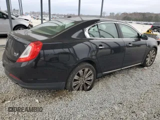 2014 Lincoln MKS EcoBoost z VIN 1LNHL9FT5EG601141, wystawiony jako Copart lot #86497854 z przebiegiem 136 915 mil mil oraz Szkoda całkowita • Salvage title. Historia ofert i sprzedaży dostępna na DreamBid. Obrazek 3.