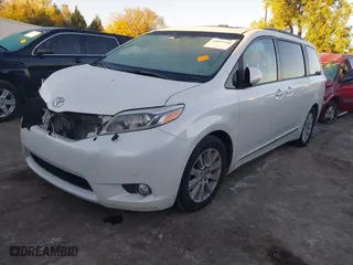 2016 Toyota Sienna XLE with VIN 5TDYK3DC9GS759983, listed as a IAAI auction lot 40859938 with 120,066 mi miles. Bid and sale history available at carsss.com. Image 18.