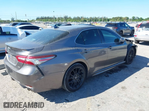 2019 Toyota Camry XSE with VIN 4T1B61HK3KU770042, listed as a IAAI auction lot 41840898 with 101,957 mi miles. Bid and sale history available at carsss.com. Image 4.