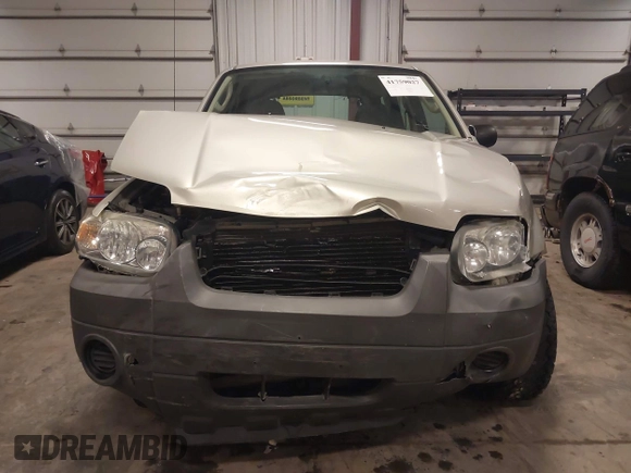 2005 Ford Escape XLS Value with VIN 1FMYU02Z35KA57707, listed as a IAAI auction lot 41759027 with 1 mi miles. Bid and sale history available at carsss.com. Image 11.