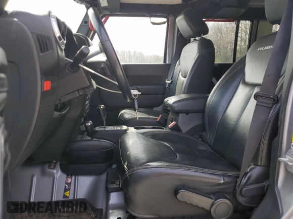 2015 Jeep Wrangler Unlimited Rubicon Hard Rock with VIN 1C4HJWFG4FL575054, listed as a Copart auction lot 51672655 with 130,405 mi miles and Clean title. Bid and sale history available at DreamBid. Image 7.