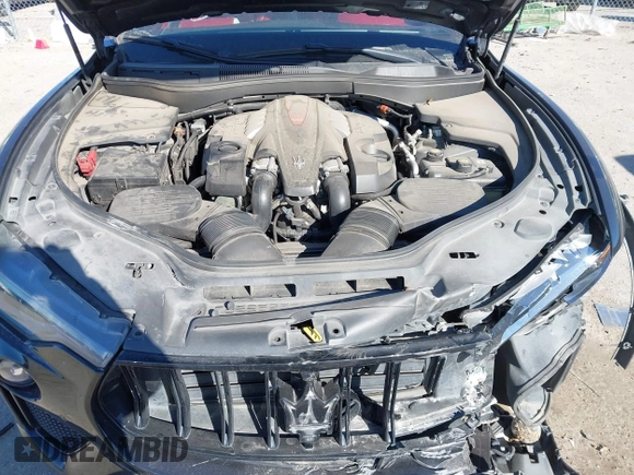 2022 Maserati Levante Modena S z VIN ZN661ZUM0NX400467, wystawiony jako IAAI lot #41294140 z przebiegiem 93 148 mil mil oraz . Historia ofert i sprzedaży dostępna na DreamBid. Obrazek 10.