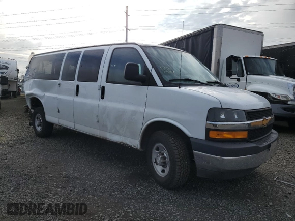 2018 Chevrolet Express Passenger LT with VIN 1GAZGPFG3J1245055, listed as a Copart auction lot 87807965 with 106,634 mi miles and Salvage title. Bid and sale history available at DreamBid. Image 4.
