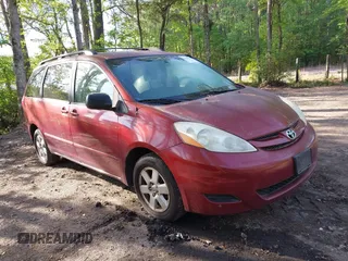 2010 Toyota Sienna CE with VIN 5TDKK4CC1AS299173, listed as a IAAI auction lot 42110416 with 239,548 mi miles. Bid and sale history available at carsss.com. Image 1.