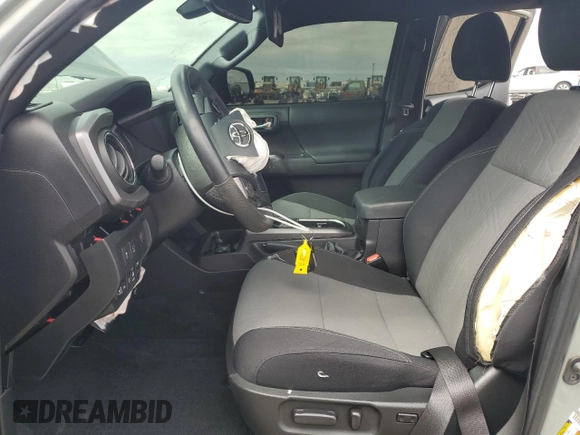 2023 Toyota Tacoma SR z VIN 3TMCZ5AN7PM593826, wystawiony jako Copart lot #50483285 z przebiegiem 14 957 mil mil oraz Szkoda całkowita • Salvage title. Historia ofert i sprzedaży dostępna na DreamBid. Obrazek 7.