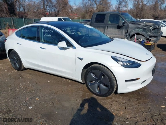 2020 Tesla Model 3 Standard Range Plus with VIN 5YJ3E1EA3LF706861, listed as a IAAI auction lot 41400754 with 85,231 mi miles. Bid and sale history available at carsss.com. Image 1.