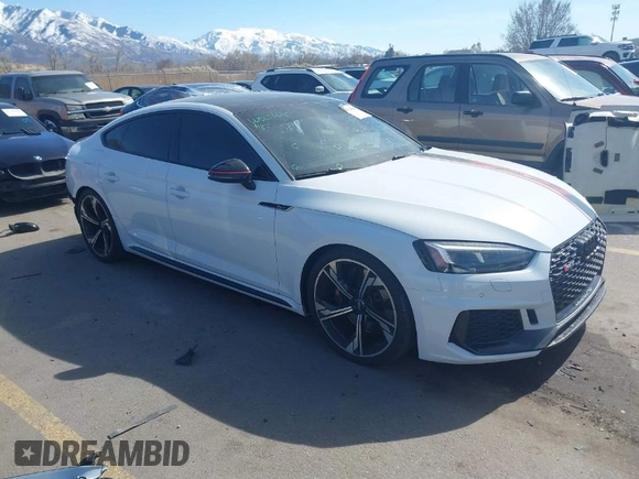 2019 Audi RS 5 Sportback z VIN WUABWCF59KA902397, wystawiony jako IAAI lot #41744364 z przebiegiem 40 477 mil mil oraz . Historia ofert i sprzedaży dostępna na DreamBid. Obrazek 1.