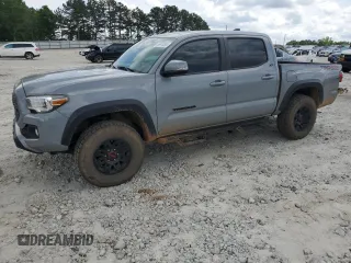 2021 Toyota Tacoma SR with VIN 3TMCZ5AN2MM397322, listed as a Copart auction lot 55470385 with 66,224 mi miles and Salvage title. Bid and sale history available at DreamBid. Image 1.