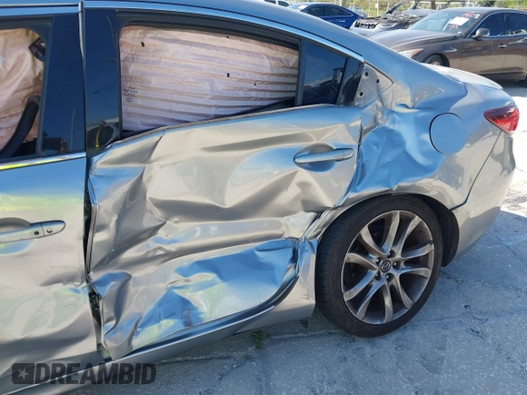 2014 Mazda 6 i Grand Touring с VIN JM1GJ1W6XE1159641, выставлен на аукционе IAAI как лот 39305628 с пробегом 107 853 миль миль и . История ставок и продаж доступна на DreamBid. Изображение 6.