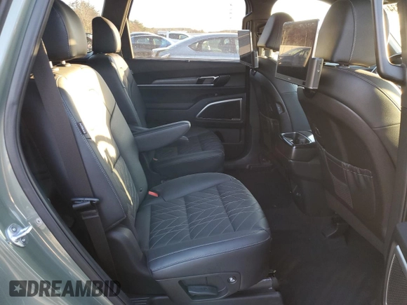 2023 Kia Telluride EX X-Line z VIN 5XYP3DGCXPG360992, wystawiony jako Copart lot #86904934 z przebiegiem 15 947 mil mil oraz Szkoda całkowita • Salvage title. Historia ofert i sprzedaży dostępna na DreamBid. Obrazek 12.