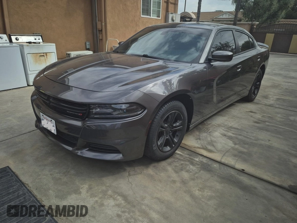 2020 Dodge Charger SXT with VIN 2C3CDXBG7LH232748, listed as a IAAI auction lot 42168856 with 26,527 mi miles. Bid and sale history available at carsss.com. Image 2.