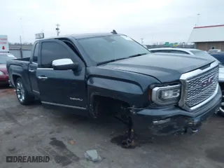 2018 GMC Sierra 1500 Denali with VIN 3GTU2PEJ8JG571593, listed as a IAAI auction lot 41169420 with 98,501 mi miles. Bid and sale history available at carsss.com. Image 1.