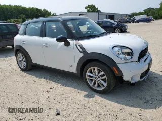 2014 MINI Countryman S with VIN WMWZC5C5XEWP37128, listed as a Copart auction lot 59549885 with 84,121 mi miles and Salvage title. Bid and sale history available at DreamBid. Image 4.