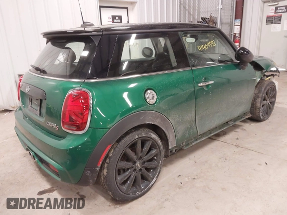 2020 MINI Hardtop Cooper S z VIN WMWXR5C01L2L36999, wystawiony jako IAAI lot #41404558 z przebiegiem 24 930 mil mil oraz . Historia ofert i sprzedaży dostępna na DreamBid. Obrazek 4.