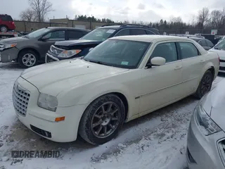 2008 Chrysler 300 Touring with VIN 2C3LA53GX8H287584, listed as a IAAI auction lot 41727222 with 166,783 mi miles. Bid and sale history available at carsss.com. Image 2.