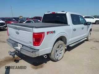 2021 Ford F-150 XL z VIN 1FTFW1E86MKD90402, wystawiony jako IAAI lot #42007680 z przebiegiem 103 724 mil mil oraz . Historia ofert i sprzedaży dostępna na DreamBid. Obrazek 4.