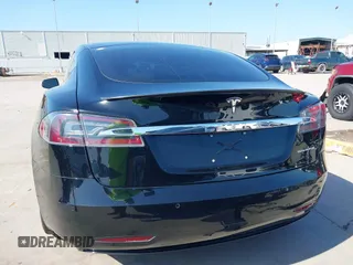 2021 Tesla Model S Long Range Plus with VIN 5YJSA1E28MF426080, listed as a IAAI auction lot 41979326 with 125,328 mi miles and . Bid and sale history available at DreamBid. Image 17.