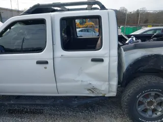 2002 Nissan Frontier SE with VIN 1N6ED27T22C355126, listed as a IAAI auction lot 41547453 with 183,125 mi miles and . Bid and sale history available at DreamBid. Image 6.