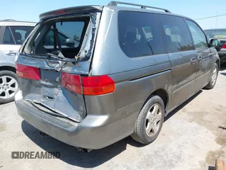 2001 Honda Odyssey EX z VIN 2HKRL18621H541553, wystawiony jako IAAI lot #42469447 z przebiegiem 241 701 mil mil oraz . Historia ofert i sprzedaży dostępna na DreamBid. Obrazek 4.
