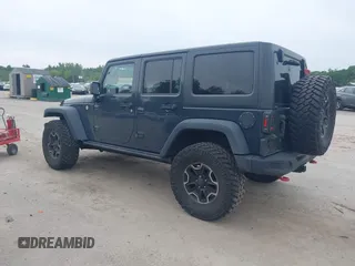 2016 Jeep Wrangler Unlimited Rubicon with VIN 1C4HJWFG6GL346862, listed as a IAAI auction lot 42441610 with 94,227 mi miles and . Bid and sale history available at DreamBid. Image 3.