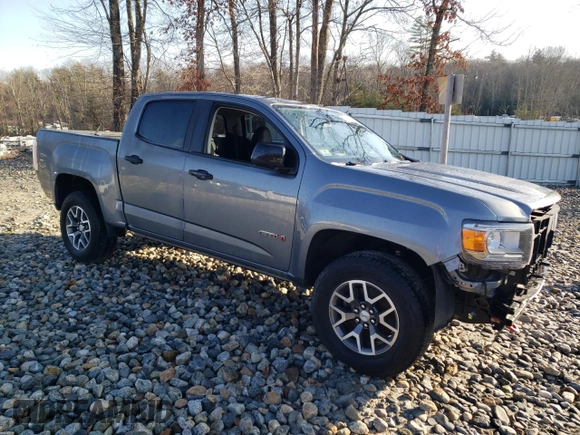 2021 GMC Canyon 4WD AT4 w/Cloth with VIN 1GTG6FEN0M1236099, listed as a Copart auction lot 80911974 with 122,672 mi miles and Salvage Title. Bid and sale history available at carsss.com. Image 4.