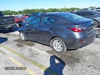 2016 Scion iA with VIN 3MYDLBZV5GY142378, listed as a IAAI auction lot 41274960 with 123,807 mi miles. Bid and sale history available at carsss.com. Image 3.