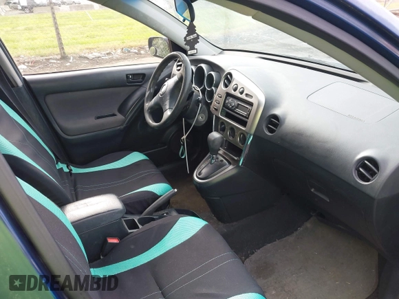 2003 Toyota Matrix Std with VIN 2T1KR32EX3C012210, listed as a IAAI auction lot 42152686 with 299,999 mi miles. Bid and sale history available at carsss.com. Image 5.