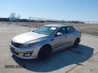 2015 Kia Optima LX with VIN 5XXGM4A78FG477630, listed as a IAAI auction lot 41771874 with 107,065 mi miles and . Bid and sale history available at DreamBid. Image 2.