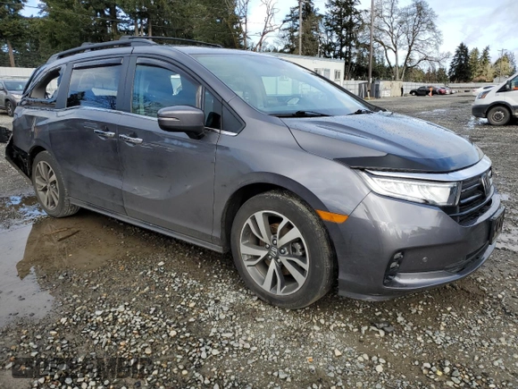 2021 Honda Odyssey Touring with VIN 5FNRL6H87MB033970, listed as a Copart auction lot 48928895 with 52,287 mi miles and Salvage Title. Bid and sale history available at carsss.com. Image 4.