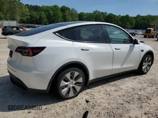 2020 Tesla Model Y Long Range z VIN 5YJYGDEEXLF043910, wystawiony jako Copart lot #54007745 z przebiegiem 102 974 mil mil oraz Szkoda całkowita • Salvage title. Historia ofert i sprzedaży dostępna na DreamBid. Obrazek 3.