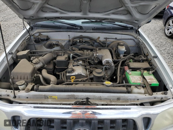 2002 Toyota Tacoma z VIN 5TEVL52N72Z007081, wystawiony jako Copart lot #52008995 z przebiegiem 218 910 mil mil oraz Szkoda całkowita • Salvage title. Historia ofert i sprzedaży dostępna na DreamBid. Obrazek 11.