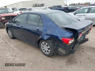 2013 Toyota Corolla L with VIN 5YFBU4EE9DP180437, listed as a IAAI auction lot 41520828 with 170,691 mi miles. Bid and sale history available at carsss.com. Image 3.